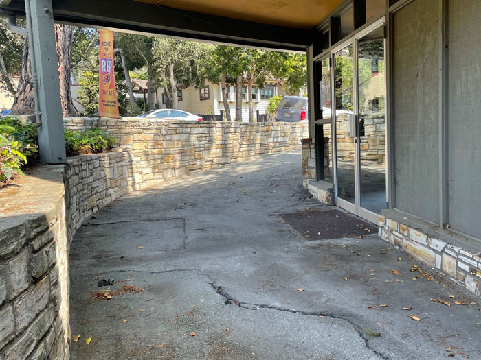 Current view of the Golden Bough front asphalt entry soon to be replaced with personalized pavers by donors to the Capital Campaign.